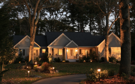 Low Voltage vs. Line Voltage Landscape Lighting: Which Is Right for Your New England Yard?